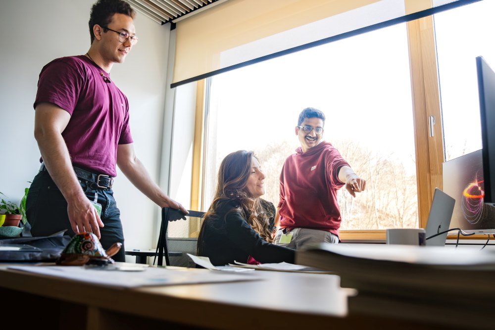 PhD student Andrei Cristea, Assistant Professor Ilaria Caiazzo, and PhD student Aayush Desai.